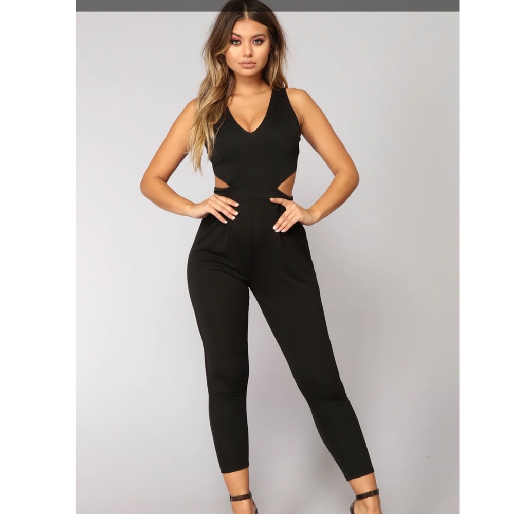 Fashion Nova brand new black cut out jumpsuit. Never worn w/tag!